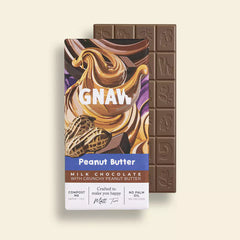 GNAW Peanut Butter milk chocolate bar with packaging on a beige background