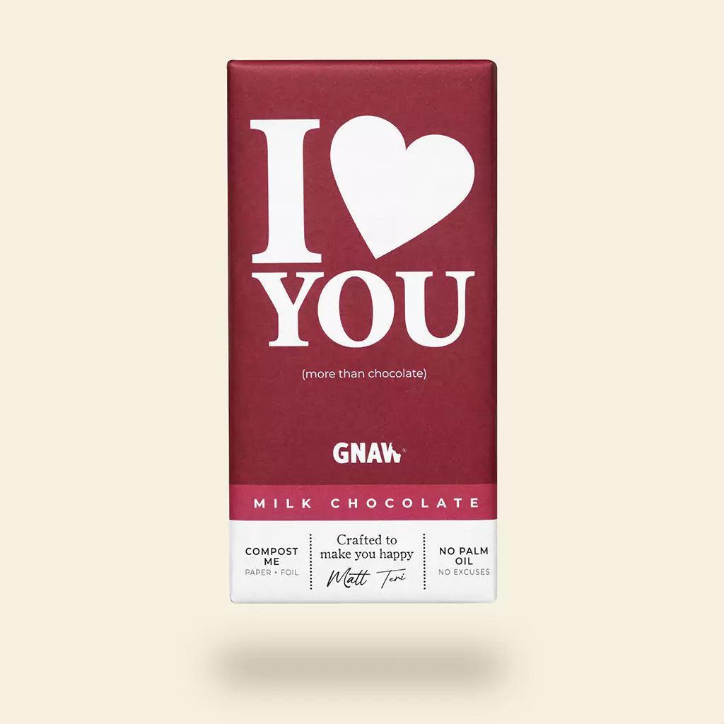 A red milk chocolate Gnaw bar with the text 'I love you' printed in white, indicating it is a gift product.