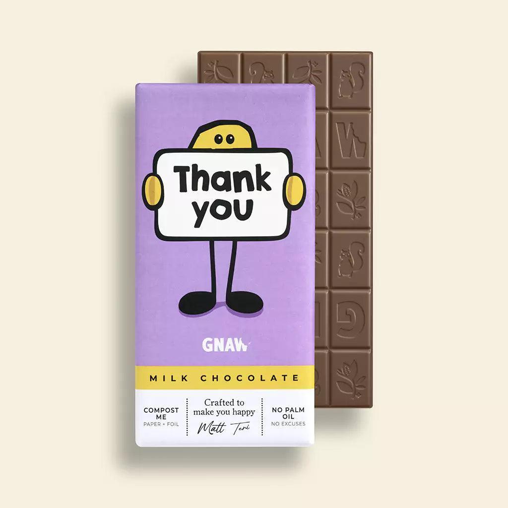 A milk chocolate bar with a 'Thank You' message in a purple wrapper featuring a cartoon character.
